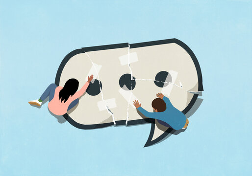 Couple mending speech bubble with adhesive tape
