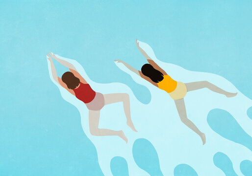 View from above of two women swimming in blue swimming pool