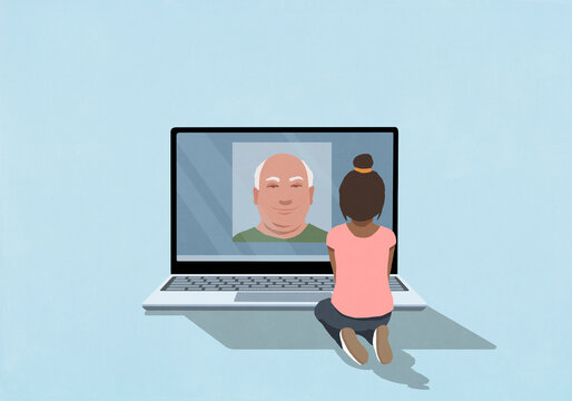 Young girl video chatting with old man on laptop screen