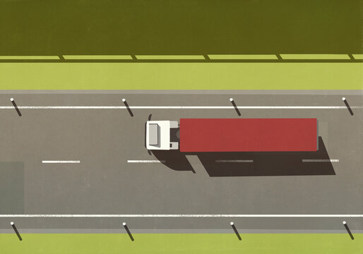 View from above of commercial semi truck driving on road