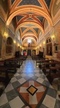 Interior of Sant Andrea church with historic altar architecture and art in Spello Umbria Italy