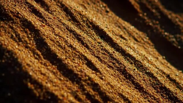 Closeup of textured brown soil with ridges and natural patterns