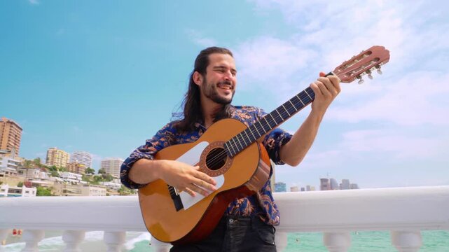 Joyful flamenco artist with guitar looking happy. Horizontal smooth handheld shot.