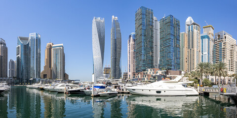 Obraz premium Dubai Marina skyline panorama cityscape with yachts skyscraper buildings living at water