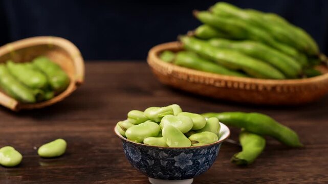 Fresh Shelled Broad Beans in Bowl on Wooden Table