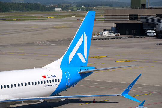 Parked Ajet passenger airplane Boeing 737 MAX 8 registration TC-OHR at Swiss Z&uuml;rich Airport on a sunny spring day. Photo taken May 26th, 2026, Zurich Airport, Switzerland.