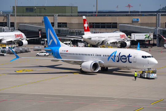 Ajet passenger airplane Boeing 737 MAX 8 registration TC-OHR pushback at Swiss Z&uuml;rich Airport on a sunny spring day. Photo taken May 26th, 2026, Zurich Airport, Switzerland.