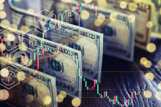 United States dollars. Pile of hundred USD banknotes. Green toned photo with selective focus