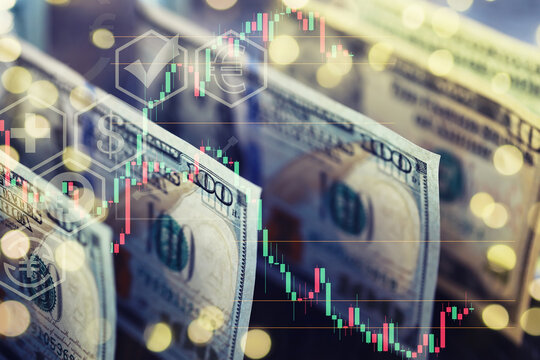 United States dollars. Pile of hundred USD banknotes. Green toned photo with selective focus