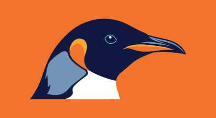 Fototapeta premium Close up profile of a penguin head with navy blue feathers a white neck and an orange patch set against a vibrant solid orange background.