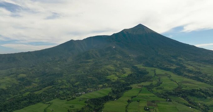 Aerial drone of agricultural plantations and farmland at the foot of the Canlaon volcano. Negros, Philippines