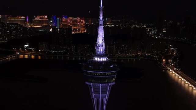 Macau tower top, casinos and hotel cityscape in background, Macau