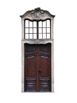 Isolated antique baroque carved wooden door with transom window.