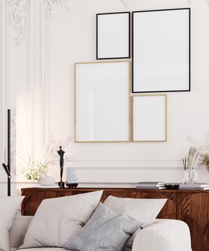 Luxury classic living room interior with blank gallery wall frames mockup, elegant molding details and stylish modern decor.