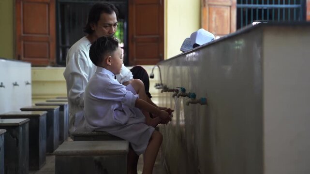A series of photos showing a heartwarming moment of an adult teaching and helping a young Muslim boy perform Wudu (Islamic ritual purification) at a mosque's ablution area before prayer.