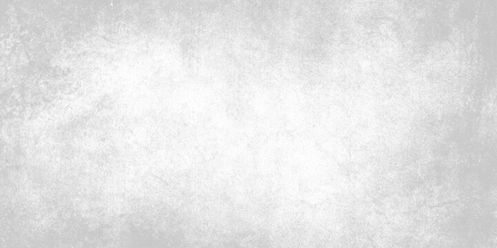Gray textured wall surface with white patches and subtle background pattern