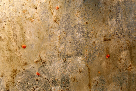 the background and texture of the glass surface looks dirty, full of grease stains, dirt spots, and faint human fingerprints