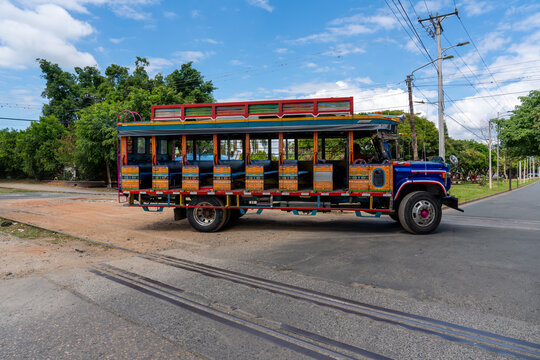 Colombia, colorful buses in the streets of Buga. 
