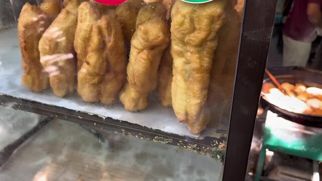 Tasty chinese snack, Cak We, made from chewy salty flour base and deep frying process