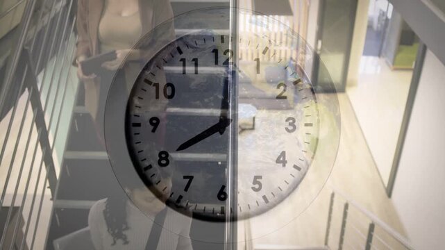 Two women stepping down office stairs, clock overlay shifting, holding railing and heading to foyer