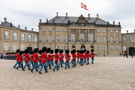 Danish Royal Guard orchestra marching at Amalienborg Palace square in Copenhagen, Denmark