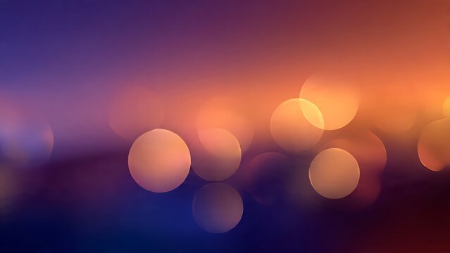Soft bokeh light orbs glowing on vibrant gradient sunset background with smooth blur