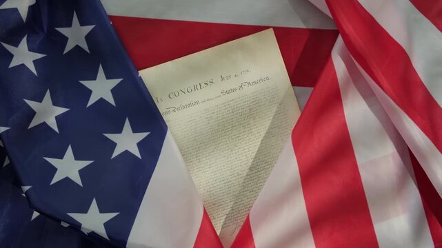 American flag with the United States Declaration of Independence