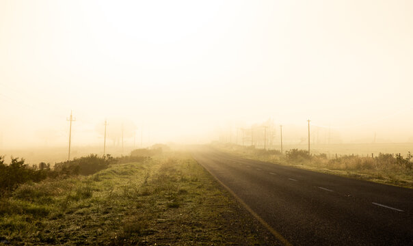 fog covered highway at sunrise, Stanford, South Africa