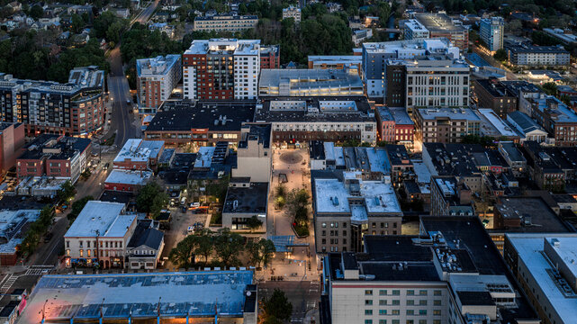 Ithaca, NY, USA - 05-18-2026  Night aerial photo of Ithaca, NY downtown, commons, on a spring evening.
