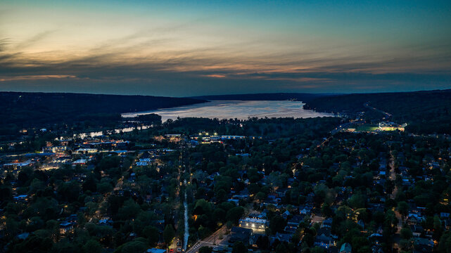 Ithaca, NY, USA - 05-18-2026  Night aerial photo of Ithaca, NY downtown, commons, on a spring evening.