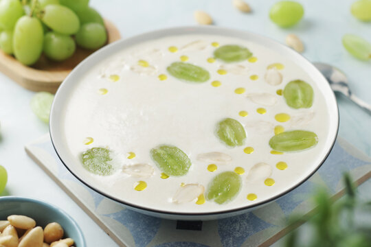 A bowl with traditional Andalusian cold soup Ajo Blanco	