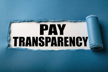 Obraz premium PAY TRANSPARENCY written on white paper under a torn blue edge