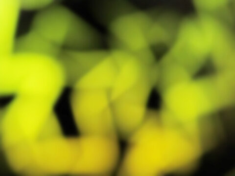 yellow glowing blurry zig zag neon lines abstract background