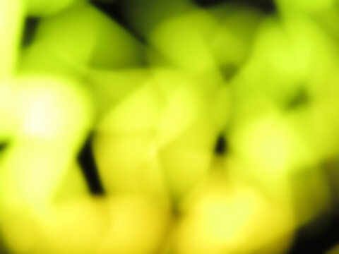 yellow glowing blurry zig zag neon lines abstract background
