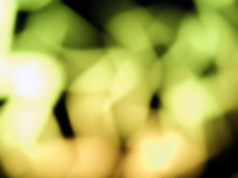 yellow glowing blurry zig zag neon lines abstract background