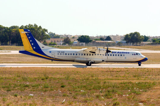 Luqa, Malta - July 16, 2007: BH Airlines ATR ATR-72-212 (REG: T9-AA) entering apron 9 after landing runway 14.