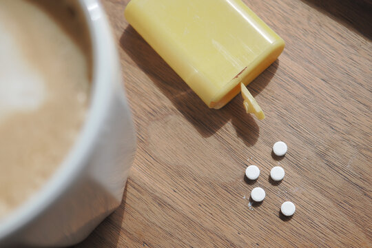 Coffee with sweetener sugar on a table