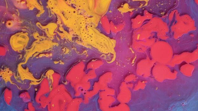 Organic Microscopic Cells Swirling in Yellow and Pink Liquid