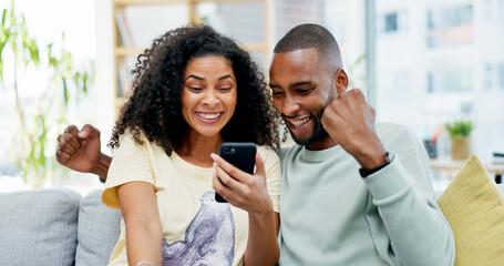 Fototapeta premium Couple, phone and sofa with celebration, success or good news for loan, bonus or online sale at home. Winner, excited and people with mobile app for registration, sign up or approval of subscription
