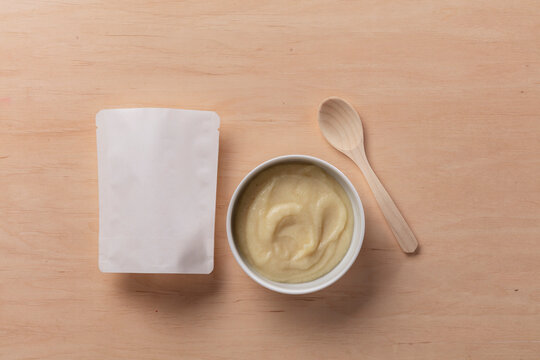 Still life of dummy food packaging for baby food.