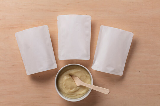 Still life of dummy food packaging for baby food.