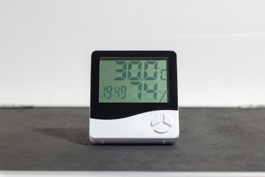Digital Thermometer and Hygrometer Displaying Temperature and Humidity. Digital Thermometer. Electronic Device. High quality photo
