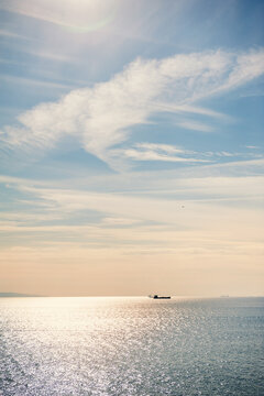 Seascape glows beneath overcast sky creates meditation mood