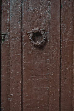 Vintage door showcases lion knocker