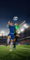 Naklejka premium Soccer players leaping for ball with motion blur in dramatic arena. Concept of football championship promo, sports training, club campaign, match poster and performance gear ads
