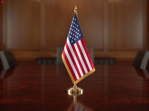 Generative AI depicts a small American flag on a polished wooden table in a formal setting