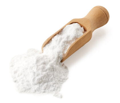 Wooden spoon of baking soda powder on white background