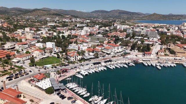 Aerial forward view of Lavrio town and yacht marina in Greece