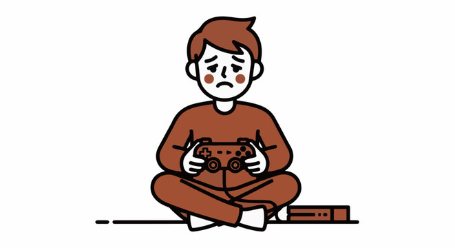 Sad young boy playing video games on floor.