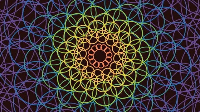 Abstract rotating rainbow mandala pattern with geometric circles